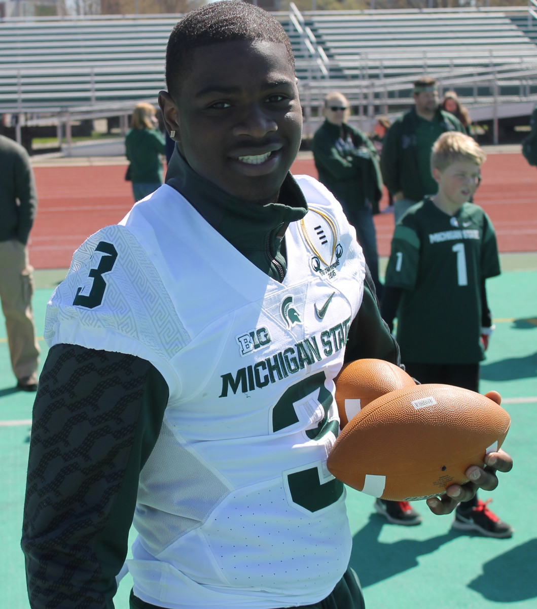 Terrific Spartan RB L.J. Scott was all smiles at the 2016 youth clinic.