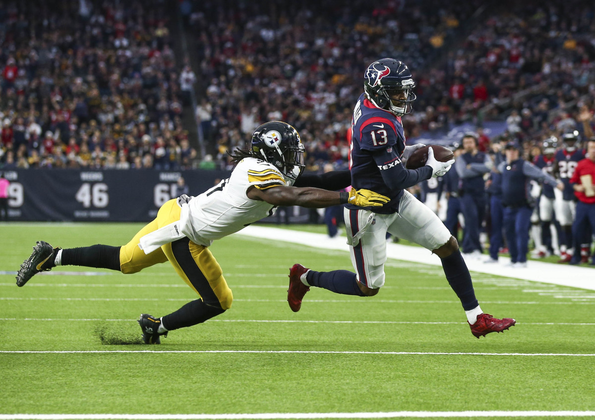 Texans wide receiver Braxton Miller runs by Pittsburgh’s Sean Spence during a 2017 game. Miller is one of eight receivers Houston has ever drafted inside the top 100 picks.