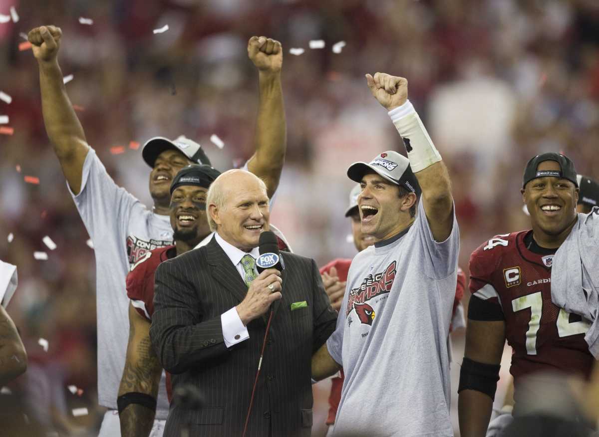 Cardinals quarterback Kurt Warner and the rest of the team celebrate after winning the 2008 NFC championship.