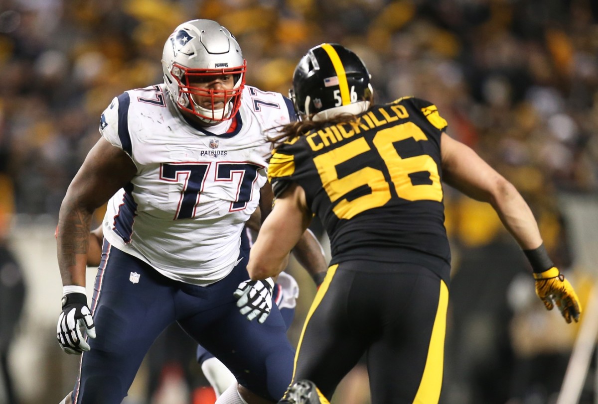 Dec 16, 2018; Pittsburgh, PA, USA; New England Patriots offensive tackle Trent Brown (77) blocks at the line of scrimmage against Pittsburgh Steelers linebacker Anthony Chickillo (56) during the fourth quarter at Heinz Field. The Steelers won 17-10. Mandatory Credit: Charles LeClaire-USA TODAY Sports