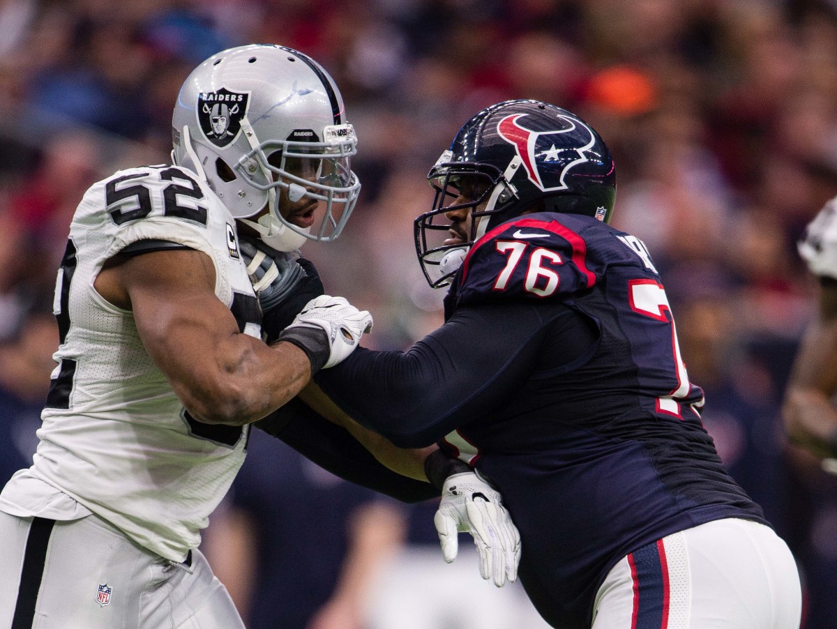 Texans tackle Duane Brown (76) fends off Raiders linebacker Khalil Mack during a 2017 playoff game.