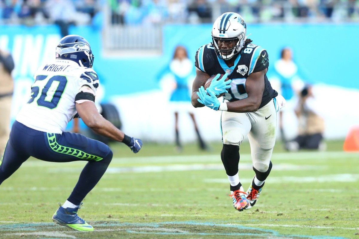 Dec 15, 2019; Charlotte, NC, USA; Carolina Panthers tight end Ian Thomas (80) runs after a reception during the fourth quarter against Seattle Seahawks outside linebacker K.J. Wright (50) at Bank of America Stadium. Mandatory Credit: Jeremy Brevard-USA TODAY Sports