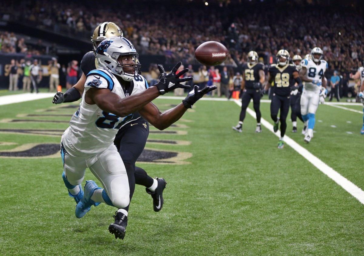 Dec 3, 2017; New Orleans, LA, USA; Carolina Panthers tight end Chris Manhertz (82) can't catch a touchdown pass while defended by New Orleans Saints defensive end Trey Hendrickson (91) in the first quarter at the Mercedes-Benz Superdome. Mandatory Credit: Chuck Cook-USA TODAY Sports