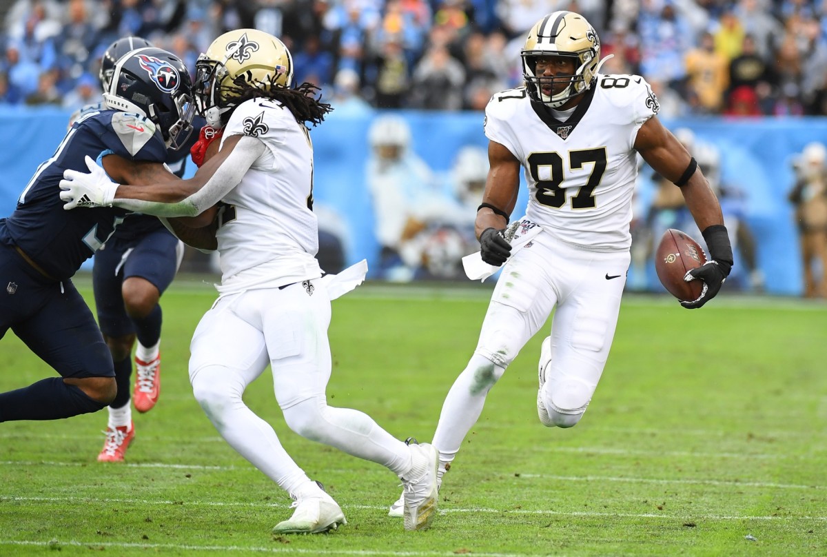 Dec 22, 2019; Nashville, Tennessee, USA; New Orleans Saints tight end Jared Cook (87) runs for a touchdown after a reception during the first half against the Tennessee Titans at Nissan Stadium. Mandatory Credit: Christopher Hanewinckel-USA TODAY Sports
