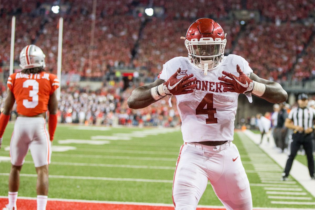 Oklahoma Sooners running back Trey Sermon (4) celebrates his touchdown in the second half of the 2017 game against the Ohio State Buckeyes at Ohio Stadium. In 2020, Sermon will be wearing an Ohio State jersey as a graduate transfer.