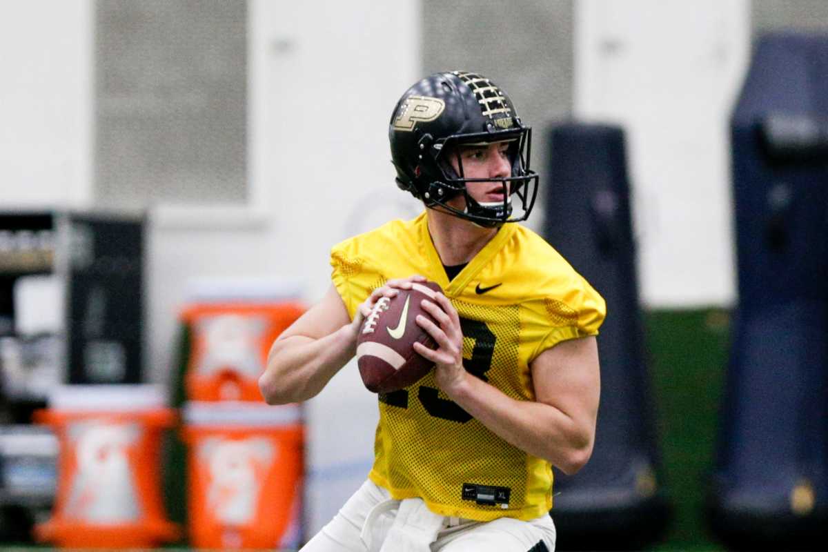 Purdue quarterback Jack Plummer (13) looks to throw during a football practice, Monday, Feb. 24, 2020 in West Lafayette.