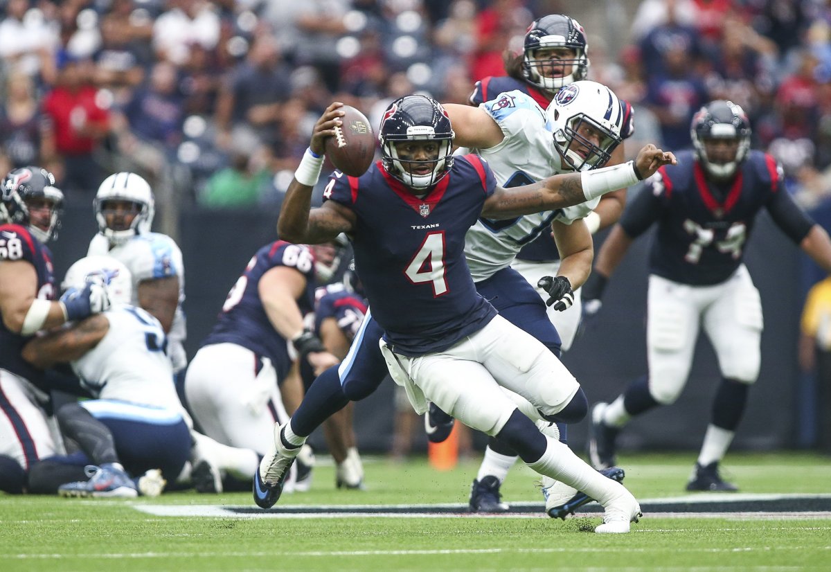 Texans quarterback Deshaun Watson (4) runs with the ball during the second quarter against the Titans at NRG Stadium, on Oct. 1, 2017.