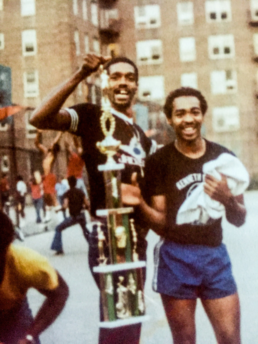 Powell (right) and Williams, with the missing-teeth smile that defined his "Flatbush Fly" days, stayed friends even when their paths diverged.