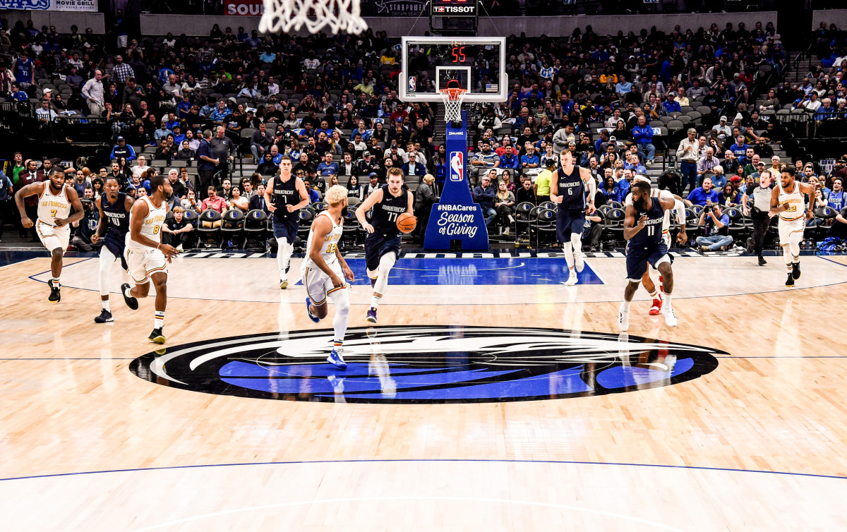 The Mavericks' website says Ronzone had “his fingerprints all over” the scouting of the team’s star, Luka Doncic.