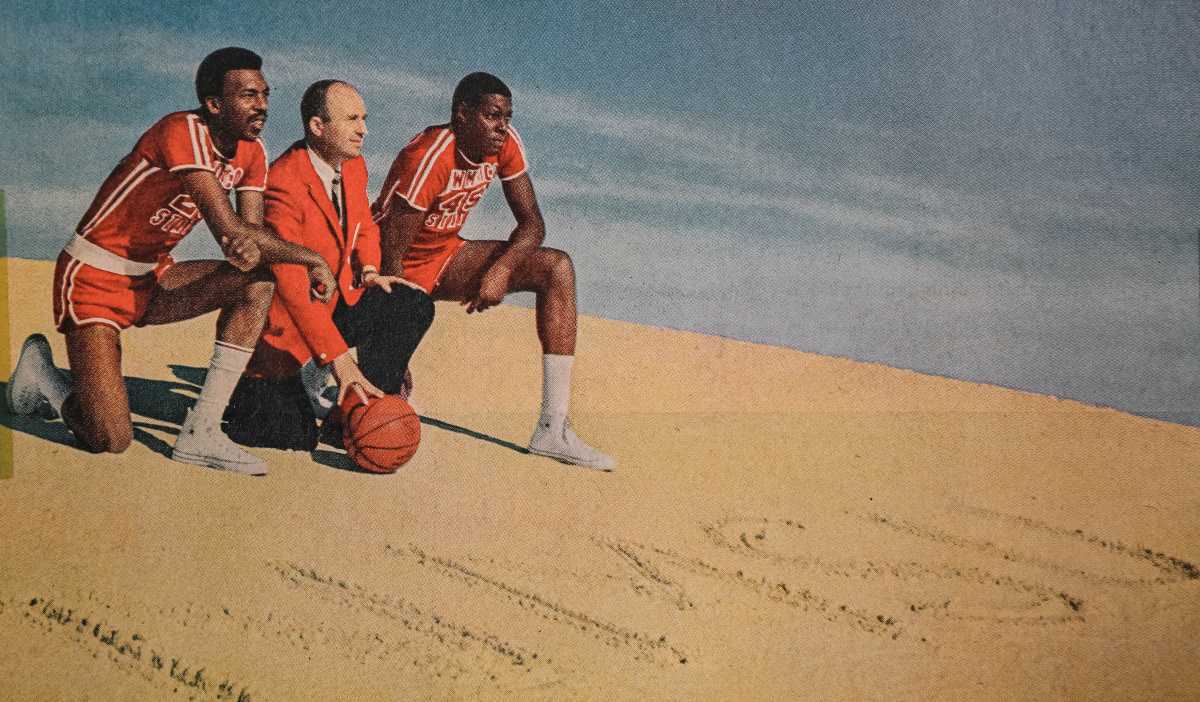 Jimmy Collins, New Mexico State head coach Lou Henson and Sam Lacey pose for a photo during the 1969-1970 season.