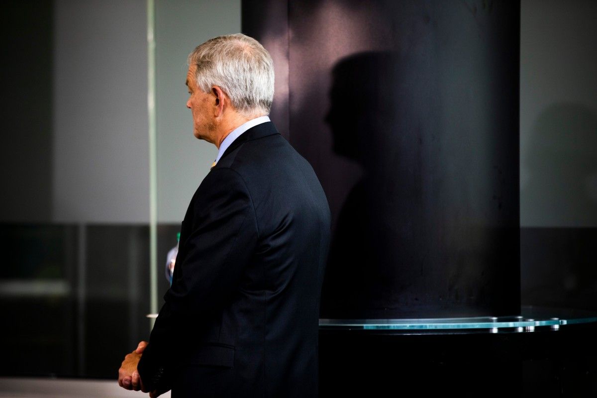 Iowa coach Kirk Ferentz listens to athletics director Gary Barta speak during Thursday's press conference. (Katina Zentz/Iowa City Press-Citizen for Imagn Content Services)