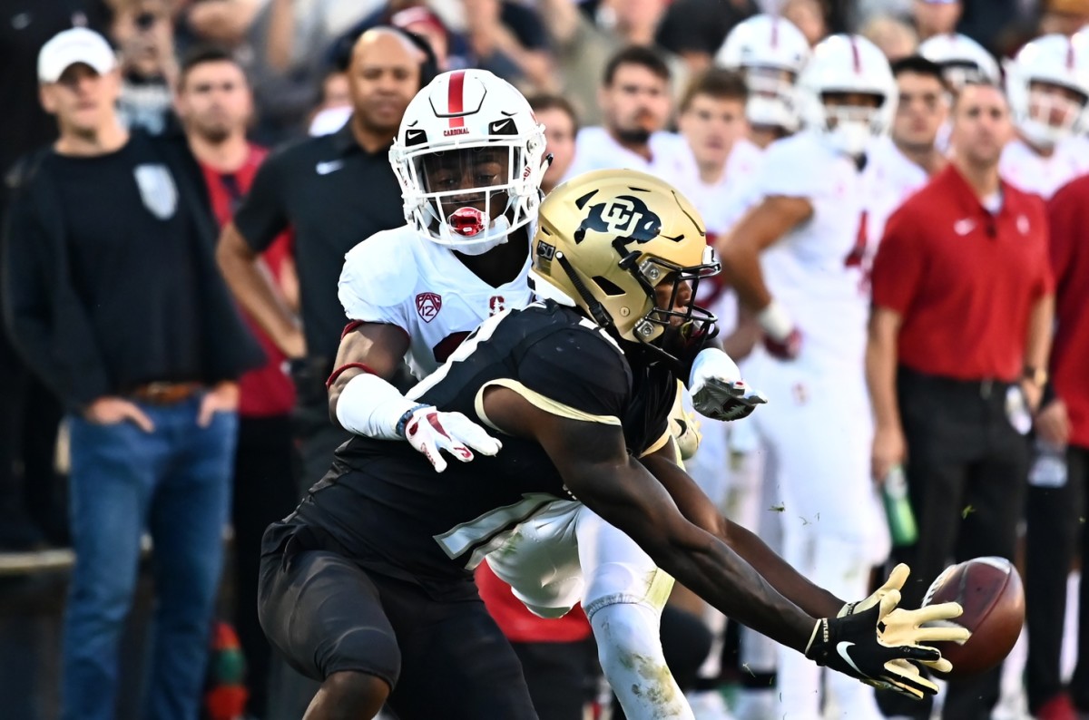 Nov 9, 2019; Boulder, CO, USA; Stanford Cardinal cornerback Kyu Blu Kelly (17) pressures a pass reception attempt by Colorado Buffaloes wide receiver Tony Brown (18) in the fourth quarter against the Stanford Cardinal at Folsom Field.