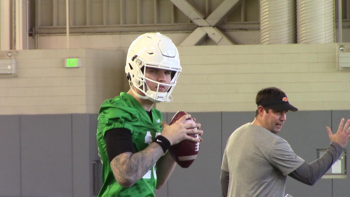 I would project Illingworth as the back-up quarterback this season despite being a true freshman. He is shown here in spring practice with quarterback coach Tim Rattay.