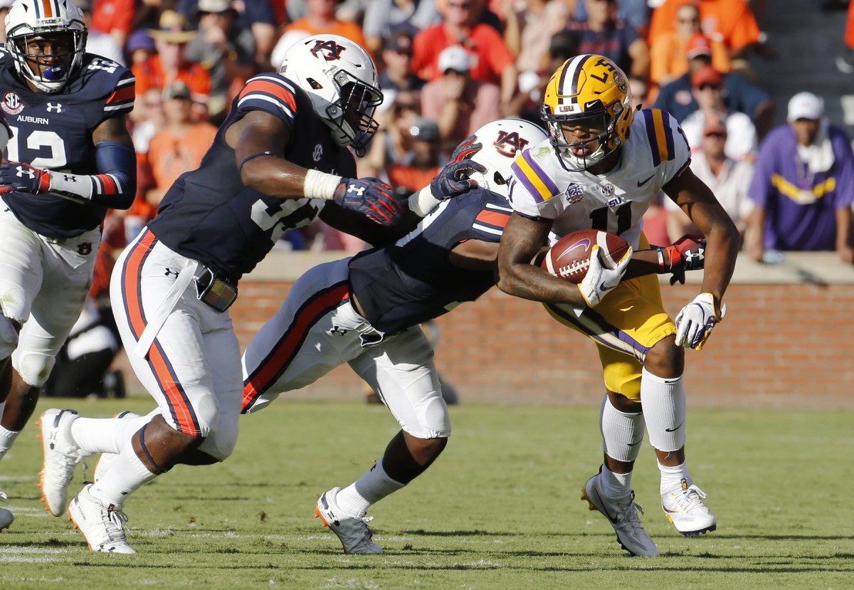 Dee Anderson catches a pass in a game at Auburn in 2018, Anderson missed all of last season at LSU.