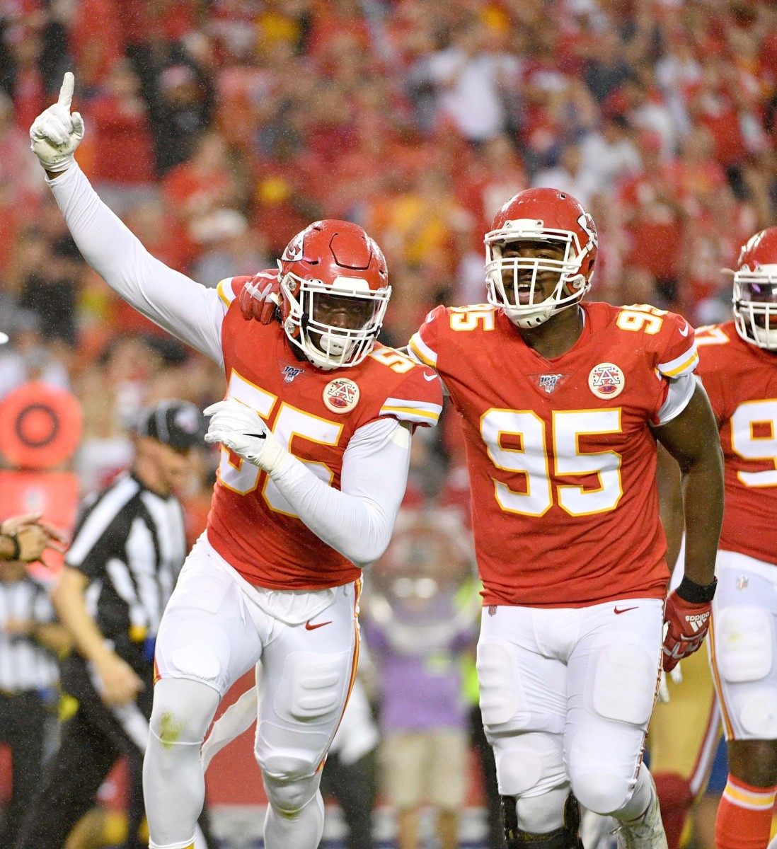 Aug 24, 2019; Kansas City, MO, USA; Kansas City Chiefs defensive end Frank Clark (55) celebrates with defensive end Chris Jones (95) after a sack during the game against the San Francisco 49ers at Arrowhead Stadium. Mandatory Credit: Denny Medley-USA TODAY Sports