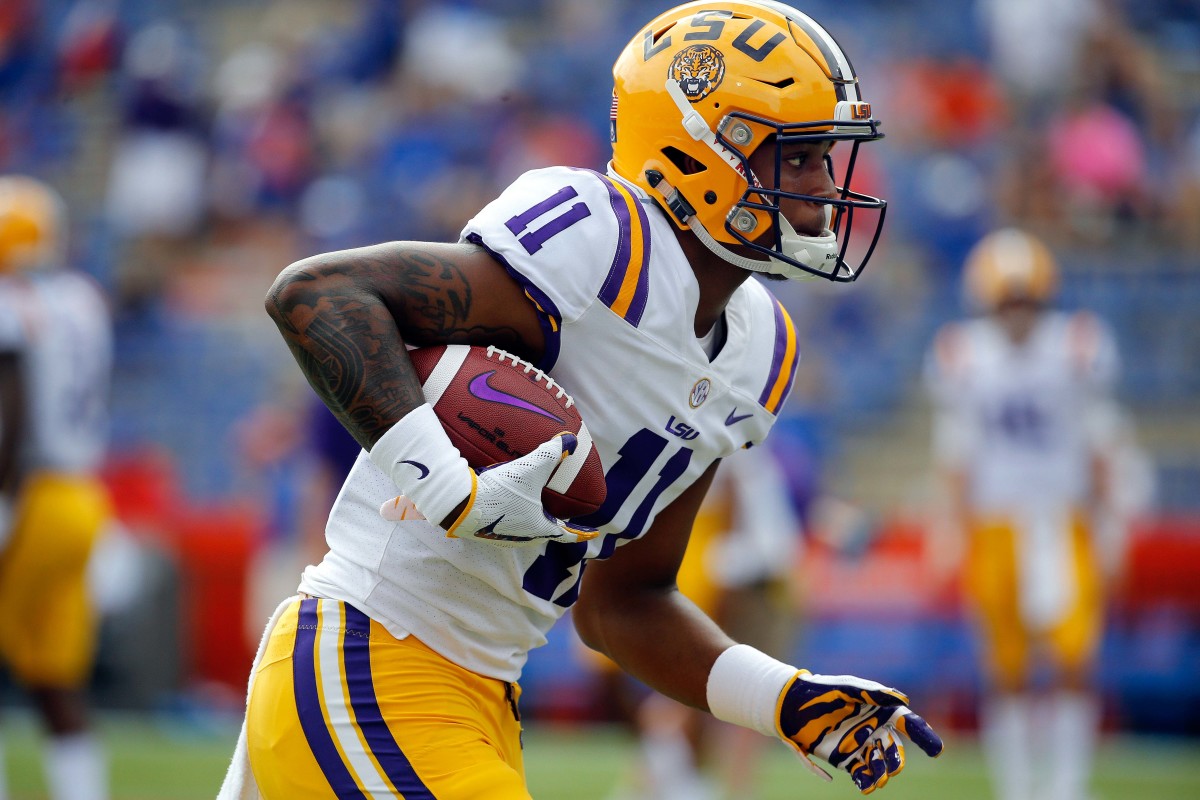 LSU Tigers wide receiver Dee Anderson (11) works out prior to the game at Ben Hill Griffin Stadium