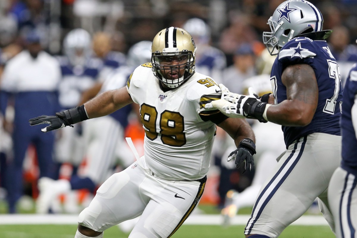 Sep 29, 2019; New Orleans, LA, USA; New Orleans Saints defensive tackle Sheldon Rankins (98) is blocked by Dallas Cowboys offensive tackle Tyron Smith (77) in the second half at the Mercedes-Benz Superdome. Mandatory Credit: Chuck Cook-USA TODAY Sports