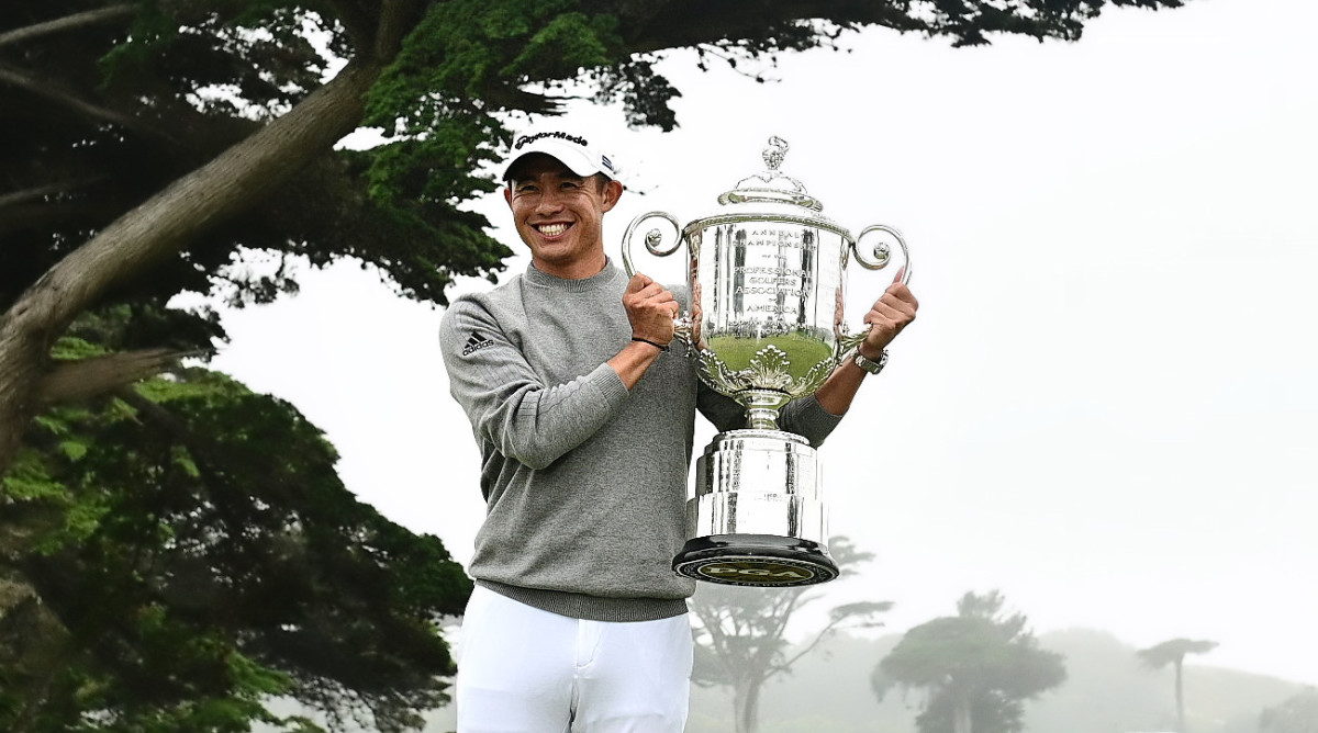 Collin Morikawa poses with the Wanamaker Trophy after winning the 2020 PGA Championship golf tournament at TPC Harding Park.