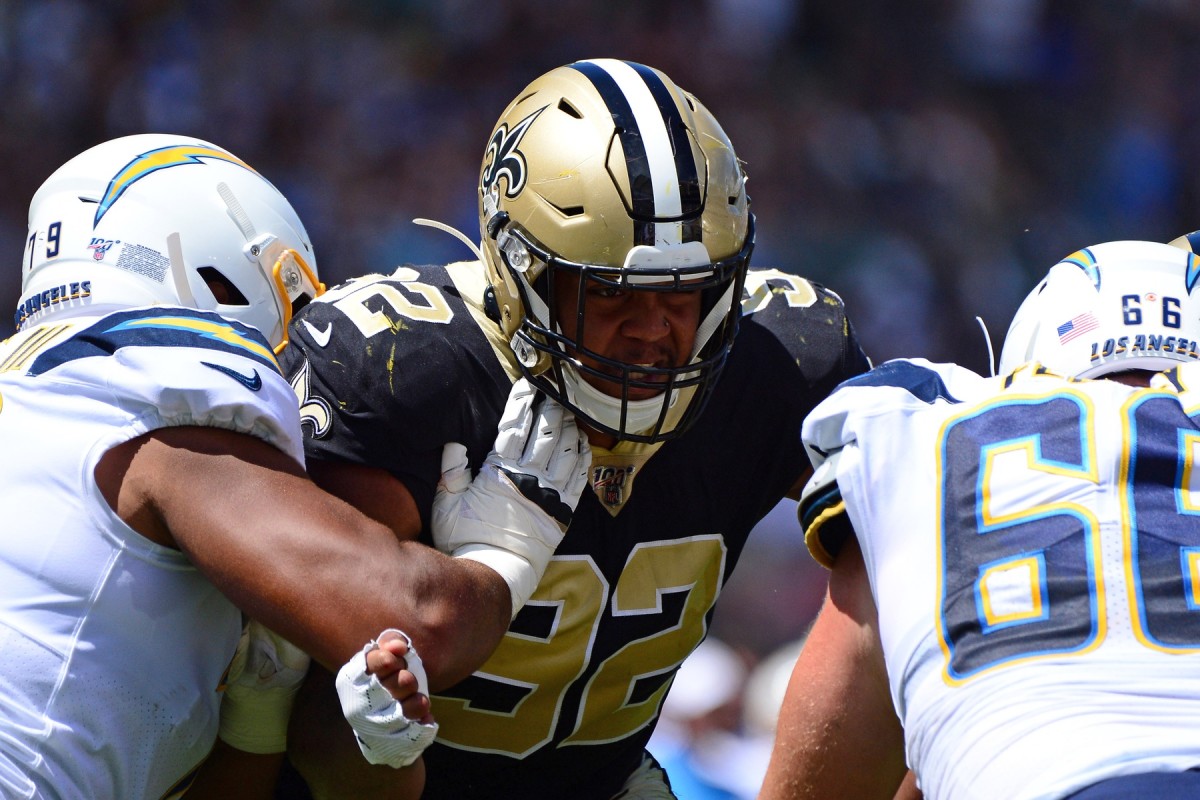 Aug 18, 2019; Carson, CA, USA; New Orleans Saints defensive end Marcus Davenport (92) works against Los Angeles Chargers offensive tackle Trey Pipkins (79) and offensive guard Dan Feeney (66) during the second quarter at Dignity Health Sports Park. Mandatory Credit: Jake Roth-USA TODAY Sports