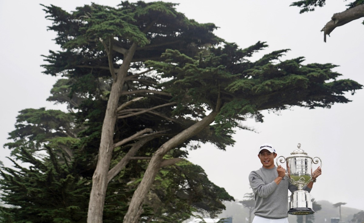 Collin Morikawa poses with the PGA Championship trophy