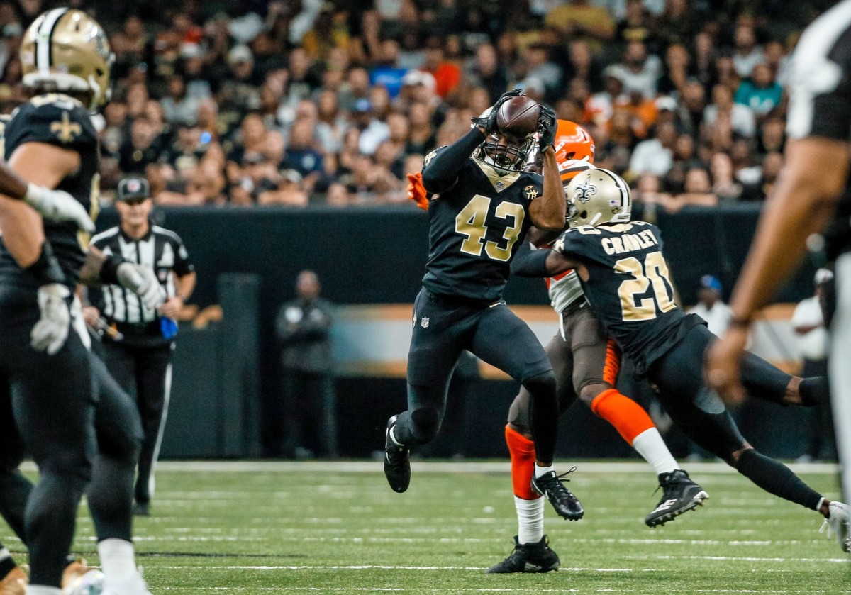 Sep 16, 2018; New Orleans, LA, USA; New Orleans Saints safety Marcus Williams (43) intercepts a pass against the Cleveland Browns during the fourth quarter at the Mercedes-Benz Superdome. The Saints defeated the Browns 21-18. Mandatory Credit: Derick E. Hingle-USA TODAY Sports