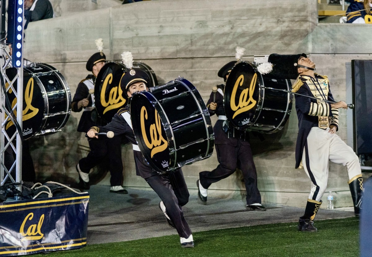 The Cal marching band takes the field at Memorial Stadium