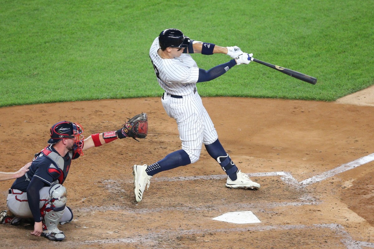 Aaron Judge hitting home run against Braves at Yankee Stadium