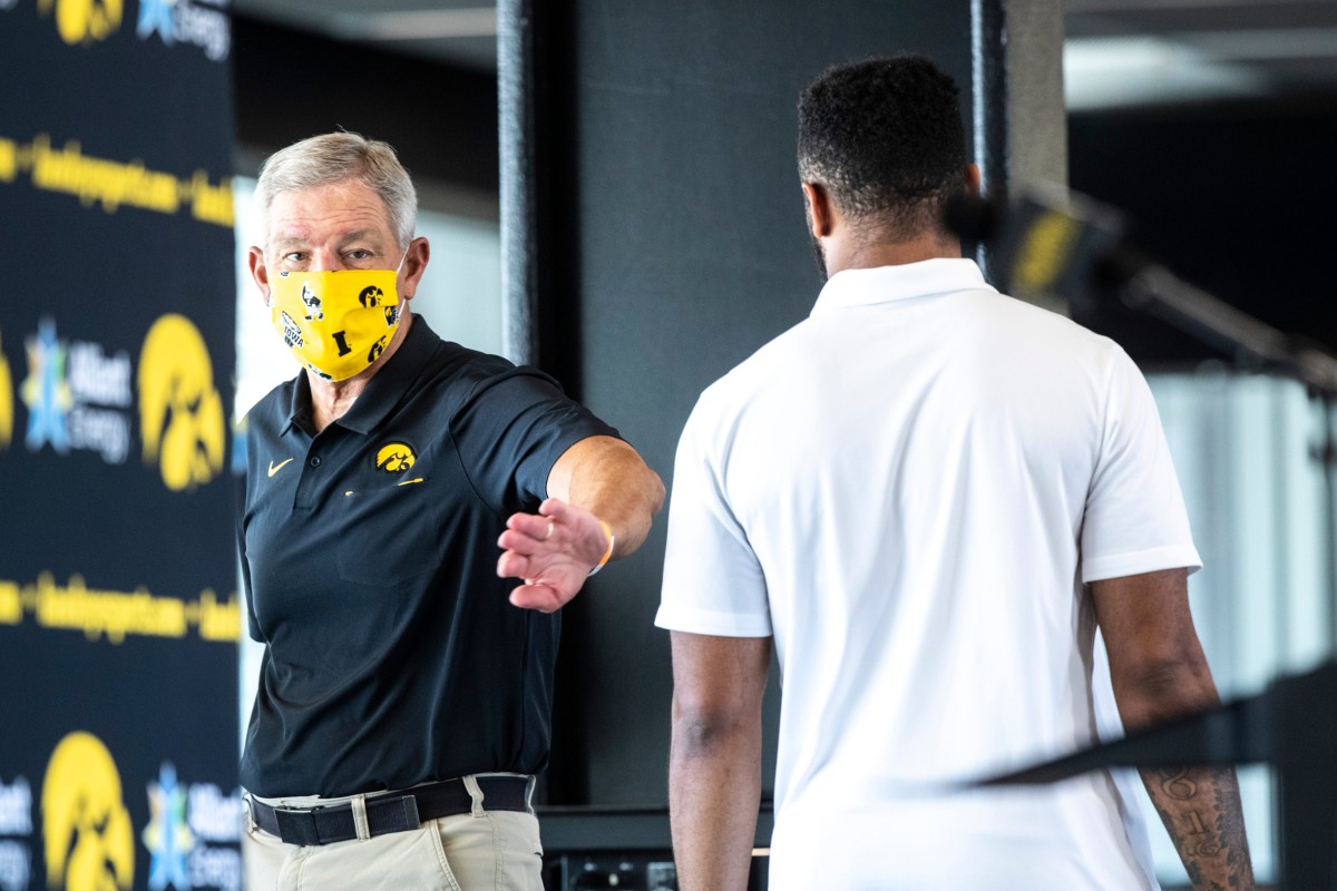 Iowa coach Kirk Ferentz wears a mask during a press conference in July. (Joseph Cress/Iowa City Press-Citizen-Imagn Content Services)