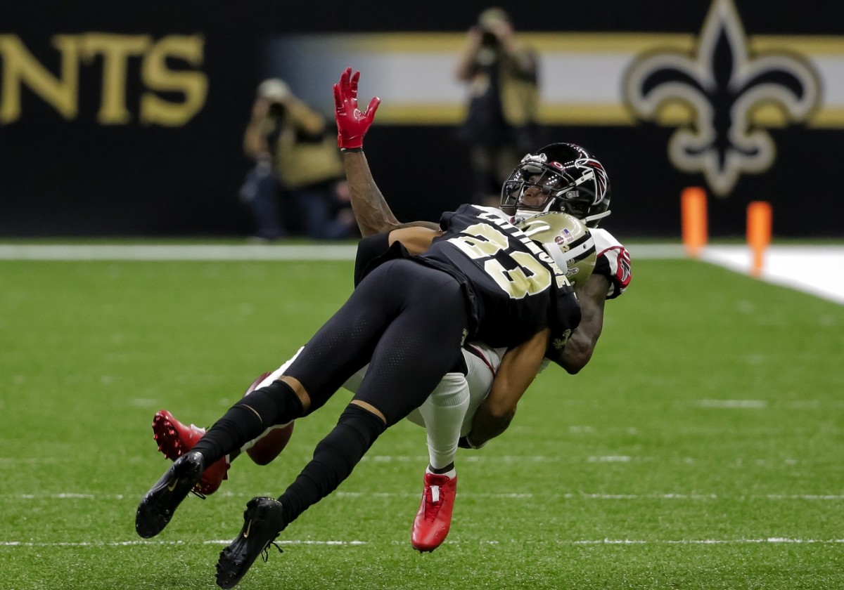 Nov 10, 2019; New Orleans, LA, USA; New Orleans Saints cornerback Marshon Lattimore (23) breaks up a pass to Atlanta Falcons wide receiver Julio Jones (11) during the first half at the Mercedes-Benz Superdome. Mandatory Credit: Derick E. Hingle-USA TODAY Sports