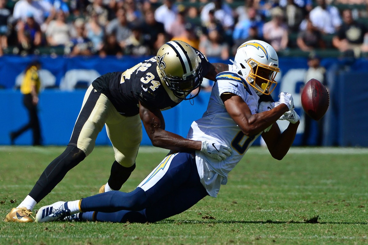 Aug 18, 2019; Carson, CA, USA; Los Angeles Chargers wide receiver Malachi Dupre (8) cannot make a catch as New Orleans Saints defensive back Justin Hardee (34) defends during the fourth quarter at Dignity Health Sports Park. Mandatory Credit: Jake Roth-USA TODAY Sports
