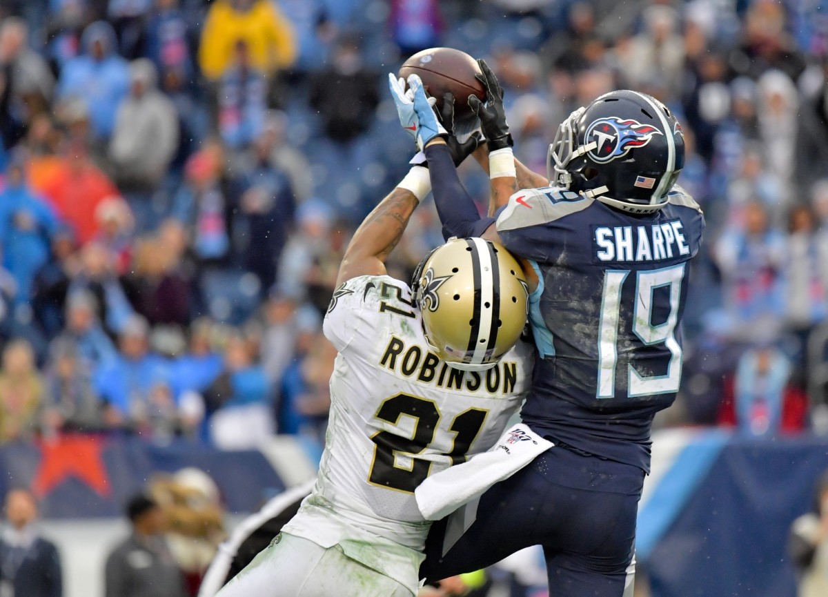 Dec 22, 2019; Nashville, Tennessee, USA; New Orleans Saints defensive back Patrick Robinson (21) breaks up a touchdown pass intended for Tennessee Titans wide receiver Tajae Sharpe (19) during the second half at Nissan Stadium. Mandatory Credit: Jim Brown-USA TODAY