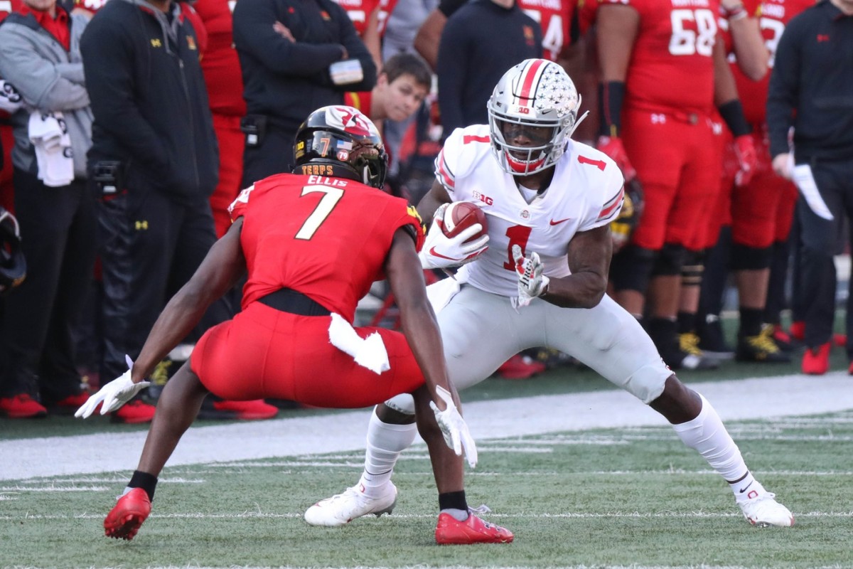 Nov 17, 2018; College Park, MD, USA; Ohio State Buckeyes wide receiver Johnnie Dixon (1) defended after a catch by Maryland Terrapins defensive back Tino Ellis (7) at Capital One Field at Maryland Stadium. Mandatory Credit: Mitch Stringer-USA TODAY