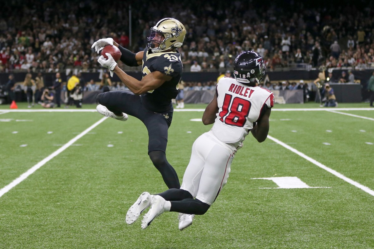 Nov 10, 2019; New Orleans, LA, USA; New Orleans Saints free safety Marcus Williams (43) intercepts a pass intended for Atlanta Falcons wide receiver Calvin Ridley (18) in the second half at the Mercedes-Benz Superdome. Mandatory Credit: Chuck Cook-USA TODAY Sports