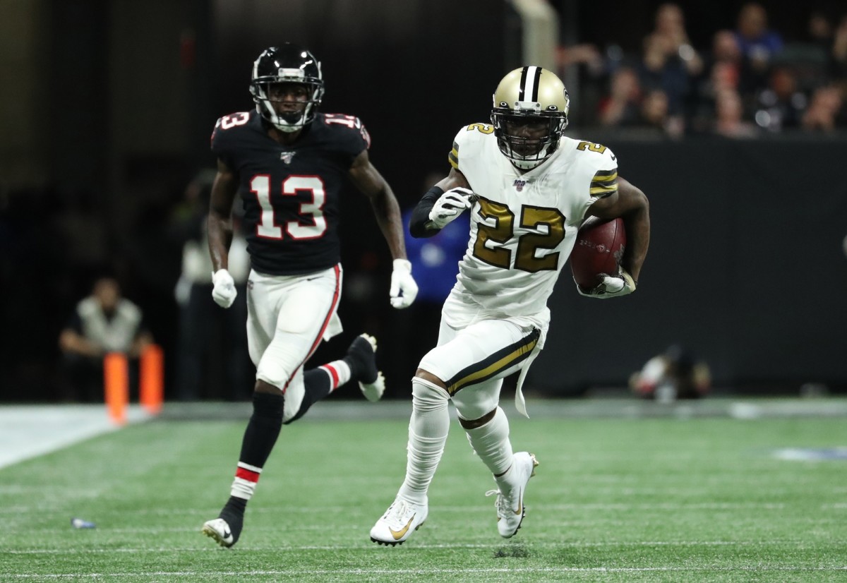 Nov 28, 2019; Atlanta, GA, USA; New Orleans Saints defensive back Chauncey Gardner-Johnson (22) returns an interception as Atlanta Falcons wide receiver Christian Blake (13) pursues in the second half at Mercedes-Benz Stadium. Mandatory Credit: Jason Getz-USA TODAY Sports