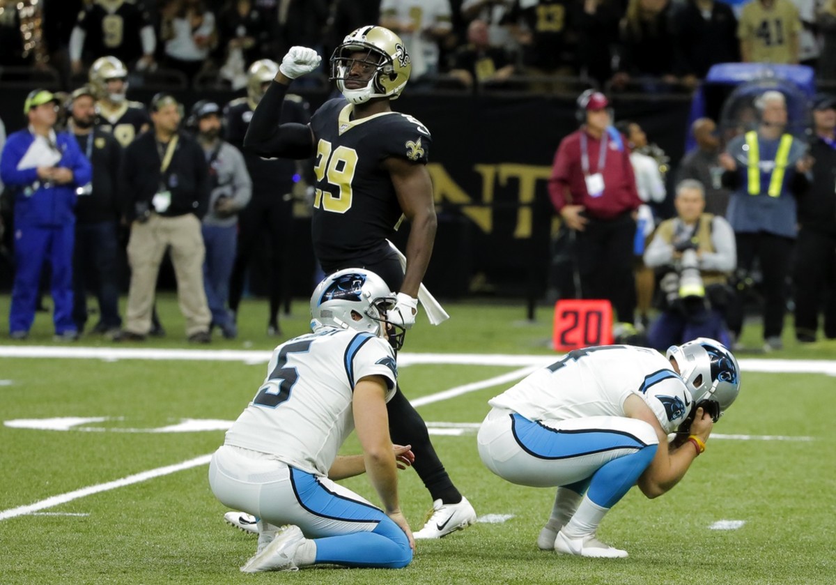 Nov 24, 2019; New Orleans, LA, USA; New Orleans Saints defensive back Johnson Bademosi (29) celebrates as Carolina Panthers kicker Joey Slye (4) reacts to missing a field goal during the fourth quarter at the Mercedes-Benz Superdome. Mandatory Credit: Derick E. Hingle-USA TODAY Sports