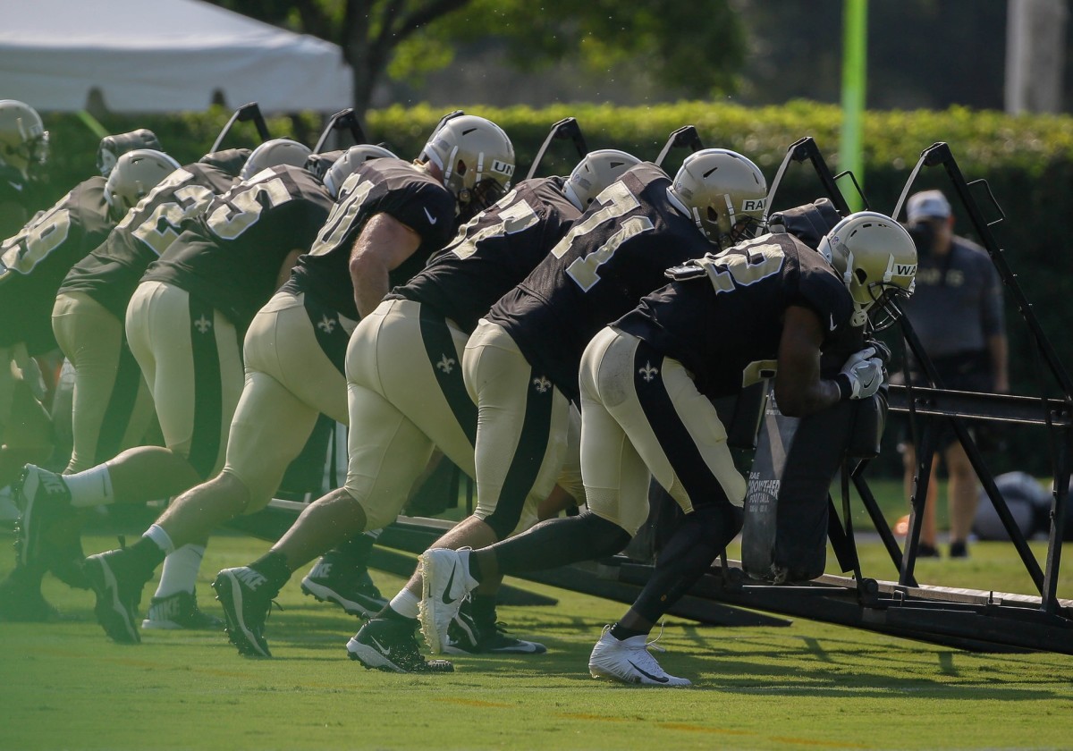 Jul 28, 2018; Metairie, LA, USA; New Orleans Saints offensive line runs a sled drill during training camp at New Orleans Saints Training Facility. Mandatory Credit: Derick E. Hingle-USA TODAY