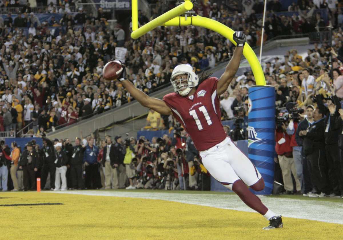 Cardinals wide receiver Larry Fitzgerald reacts after scoring against the Steelers in Super Bowl XLIII.