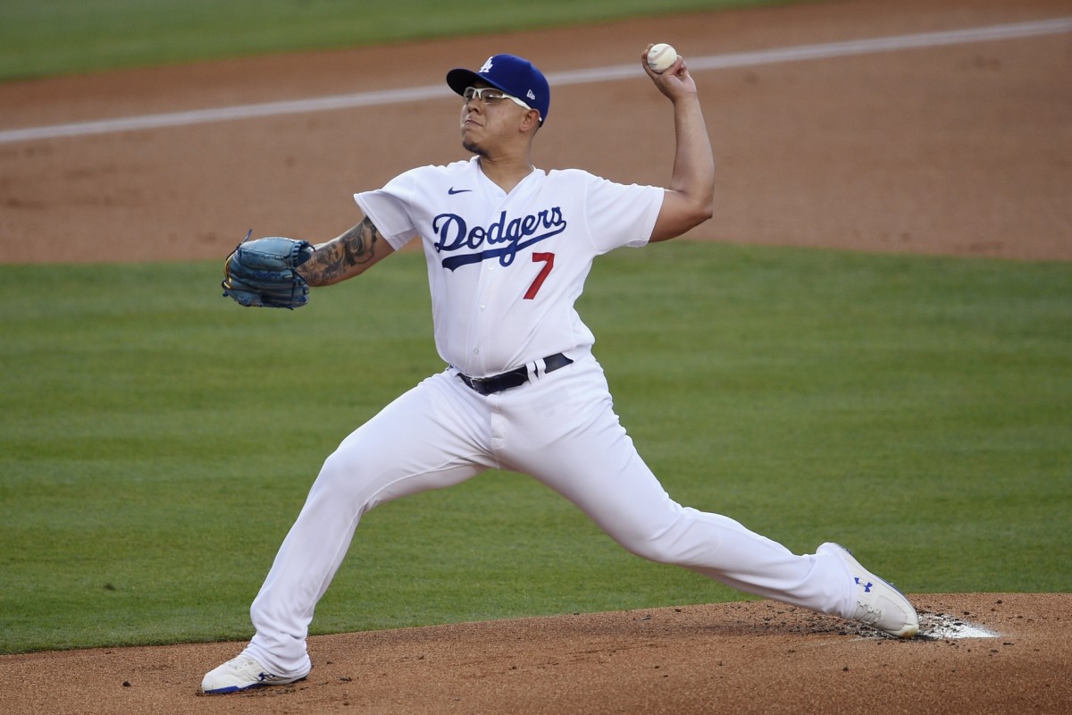 Aug 13, 2020; Los Angeles, California, USA; Los Angeles Dodgers relief pitcher Julio Urias (7) delivers a pitch during the first inning against the San Diego Padres at Dodger Stadium. Mandatory Credit: Kelvin Kuo-USA TODAY Sports