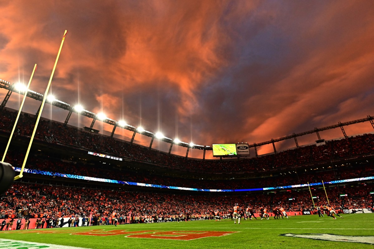 General view of a sunset over Empower Field at Mile High during the fourth quarter of the game between the Cleveland Browns against the Denver Broncos.