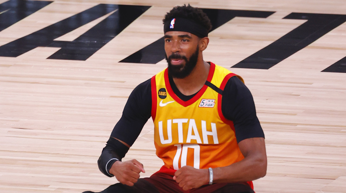 Mike Conley #10 of the Utah Jazz reacts after being fouled against the Denver Nuggets during the third quarter in Game Three of the Western Conference First Round during the 2020 NBA Playoffs