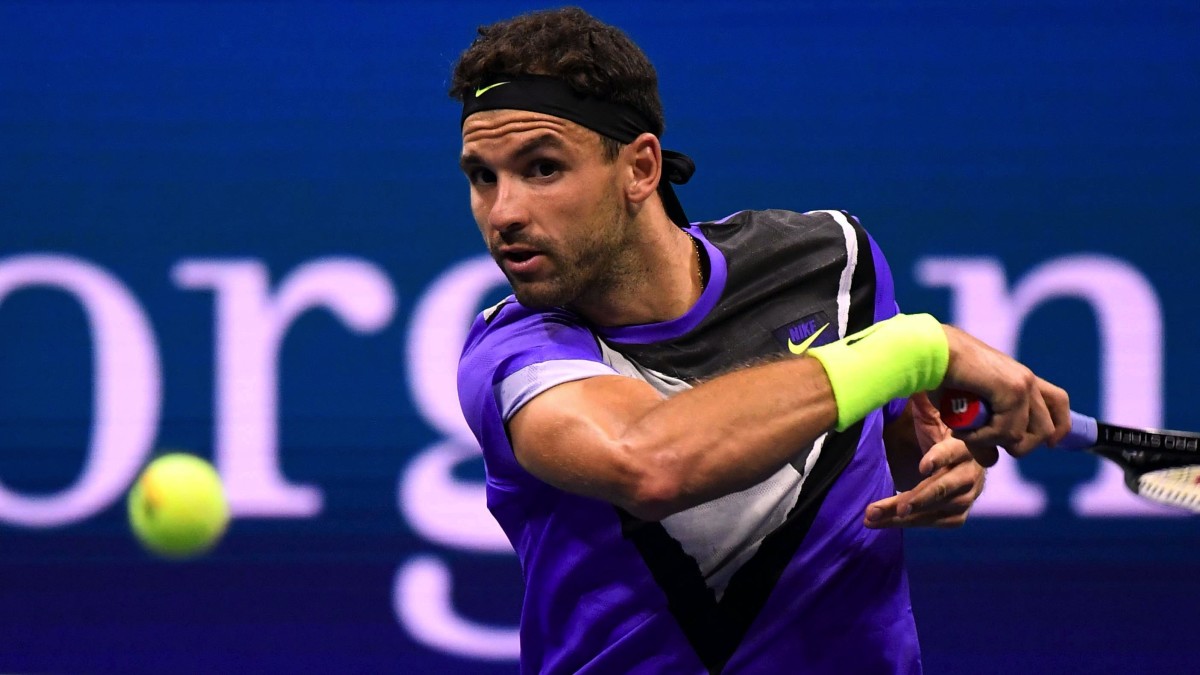 Grigor Dimitrov of Bulgaria hits to Daniil Medvedev of Russia in a semifinal match on day twelve of the 2019 US Open tennis tournament at USTA Billie Jean King National Tennis Center.