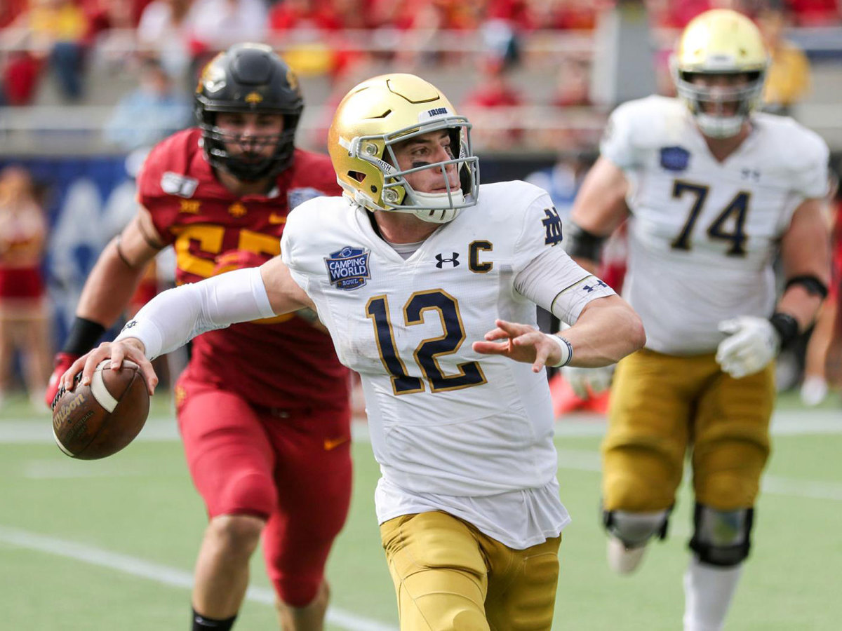 Notre Dame QB Ian Book throws a pass