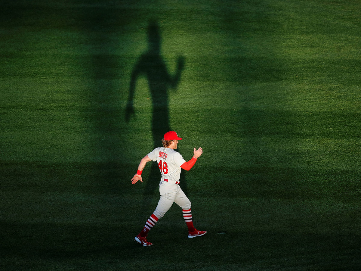 Harrison Bader walking in the outfield