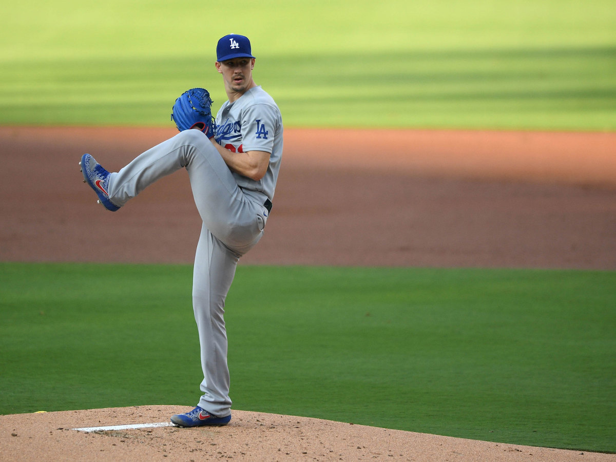 Walker Buehler prepares to throw a pitch