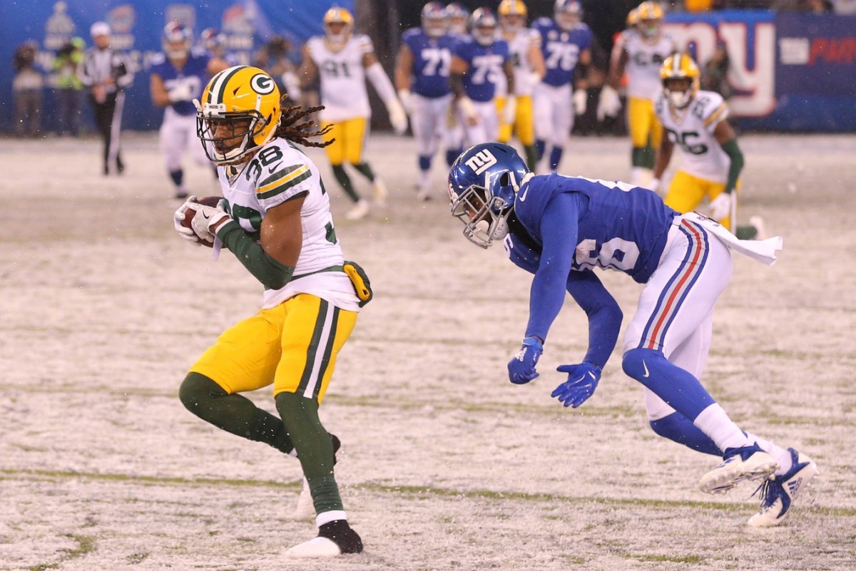 Dec 1, 2019; East Rutherford, NJ, USA; Green Bay Packers cornerback Tramon Williams (38) intercepts a pass intended for New York Giants wide receiver Darius Slayton (86) during the fourth quarter at MetLife Stadium. Mandatory Credit: Brad Penner-USA TODAY Sports