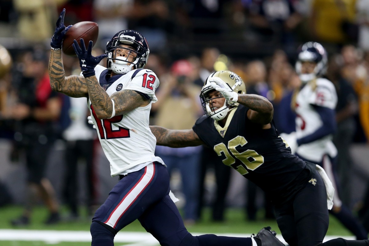 Sep 9, 2019; New Orleans, LA, USA; Houston Texans wide receiver Kenny Stills (12) makes a touchdown catch defended by New Orleans Saints cornerback P.J. Williams (26) in the fourth quarter at the Mercedes-Benz Superdome. Mandatory Credit: Chuck Cook-USA TODAY Sports