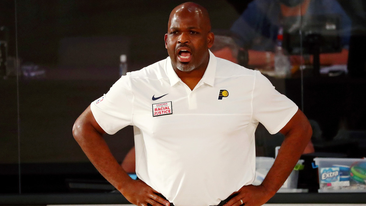 Indiana Pacers head coach Nate McMillan gives instruction during the first half of a NBA basketball game against the Miami Heat.