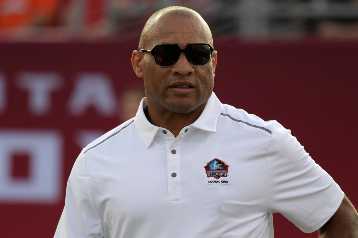 Hall of Famer Aeneas Williams walks on the sideline prior to the 2019 Hall of Fame Game in Canton, Ohio.