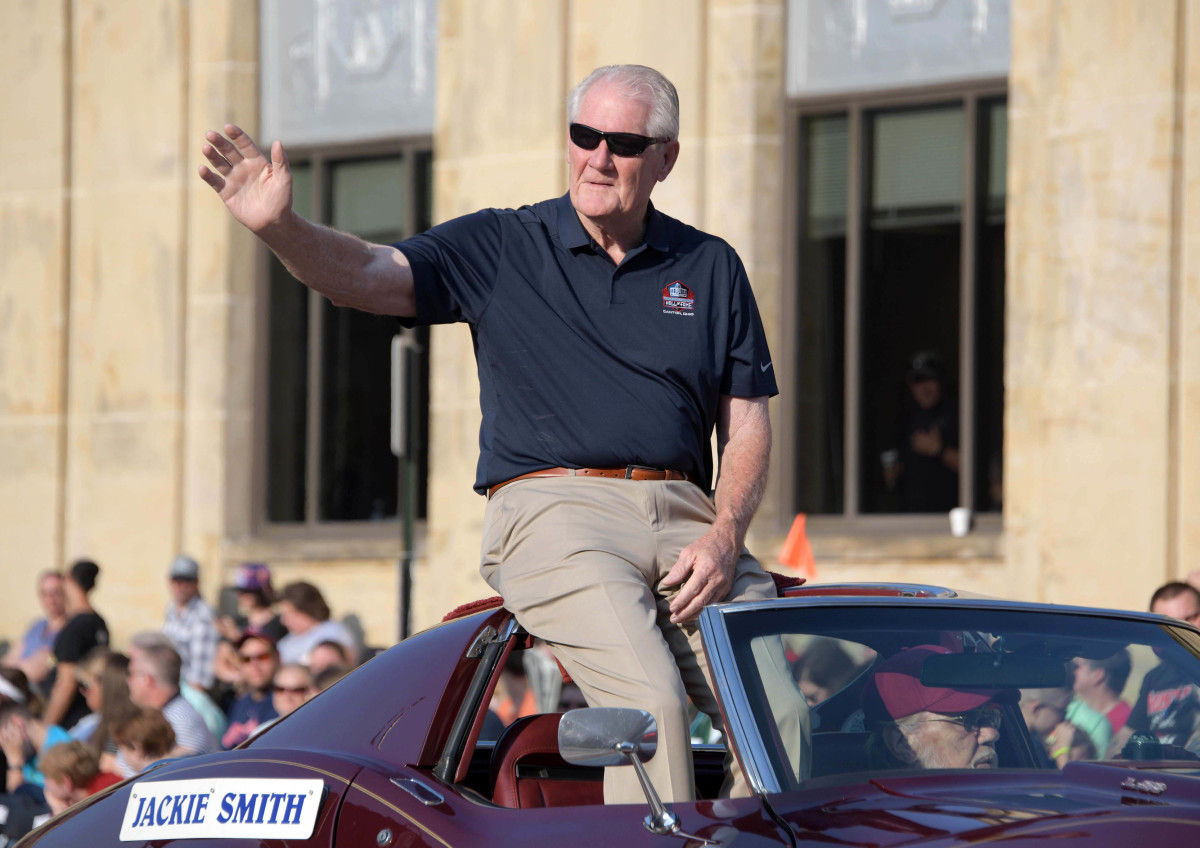 Hall of Famer Jackie Smith rides during the annual Grand Parade prior to the 2018 Pro Football Hall of Fame induction ceremony.