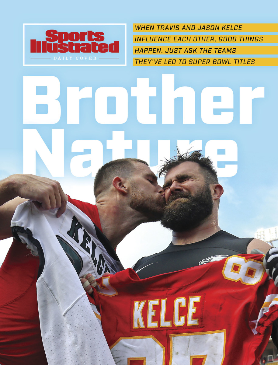 Travis Kelce gives brother Jason a post-game kiss on the cheek as they exchange jerseys